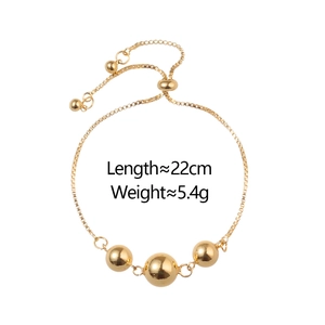 Vue détaillée du bracelet à billes dorées ajustable avec taille et poids indiqués