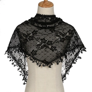 Elegant black lace triangular shawl with hollow floral patterns and fringe tassels