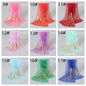 Grid display of lightweight peacock feather gold-stamped scarves in nine vibrant colors