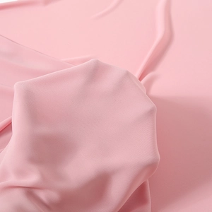 Elegant solid pink chiffon scarf with premium textured fabric and soft drape for women