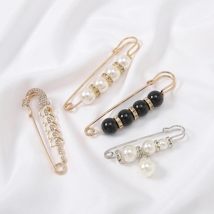Exquisite anti-glare brooch set with faux pearls and rhinestones for dress decor.