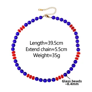 Detail view of colorful glass bead necklace with gold clasp and 39.5cm length dimensions