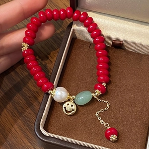 New Chinese red pearl beaded bracelet with jade and golden smiley face charm