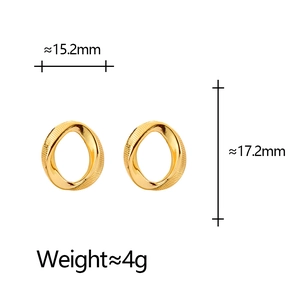 Minimalist twisted gold geometric hoop earrings for women with textured metal finish