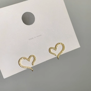Elegant gold plated hollow heart stud earrings with cubic zirconia micro pavé stones
