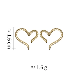 Detailed size view of gold plated heart stud earrings with white zircon accents