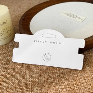 Minimalist white jewelry display card for bracelets with elegant fashion jewelry text