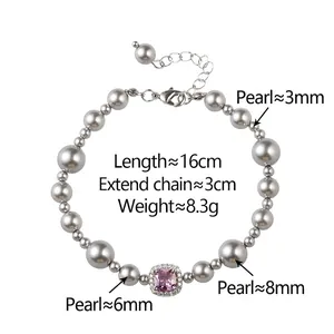Bracelet perles grises avec zircon rose carré et fermoir mousqueton réglable
