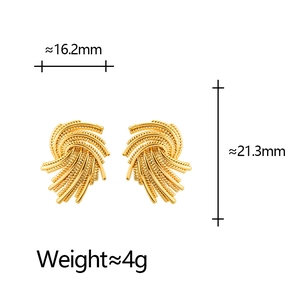 Vintage golden woven stud earrings with textured feather design on white background
