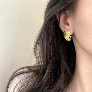 Elegant gold woven spiral stud earrings with vintage textured metal design for women