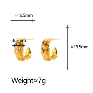 Modern molten golden C-shape earrings with irregular texture, 19.5mm diameter measurements