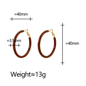 Detail view of 40mm retro dark brown hoop earrings with size dimensions and gold clasp