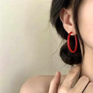 French vintage style large red enamel hoop earrings for women shown on model