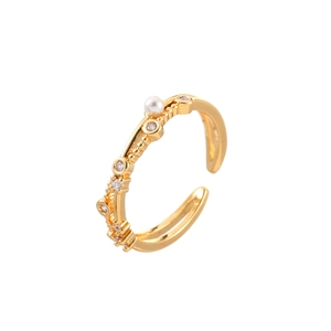 Elegant gold open ring with woven design, white pearl and zircon accents on white background