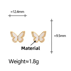 Détails et dimensions des boucles d'oreilles papillon avec zircon et résine blanche