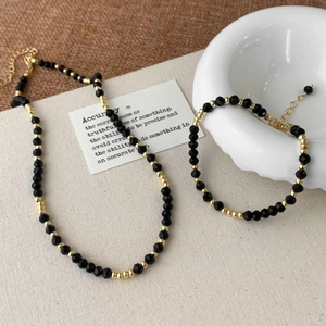 French vintage black crystal beaded necklace and bracelet set with gold metal accents