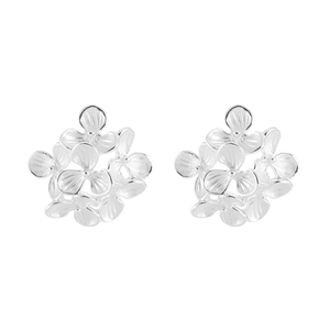 French vintage silver flower stud earrings with detailed petal texture on white background