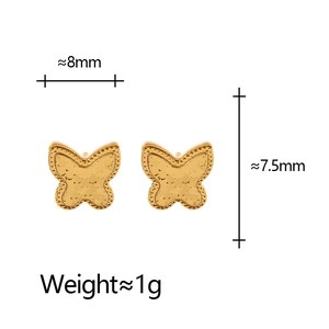 Close-up of gold butterfly stud earrings showing detailed textured wings and dimensions