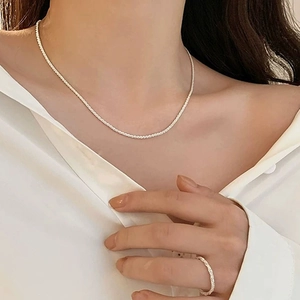 Elegant silver minimalist chain necklace and matching textured ring set for women