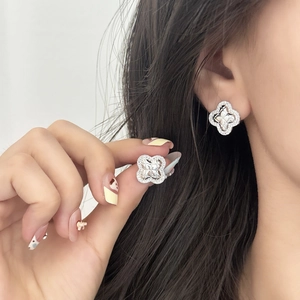 Elegant four-leaf clover stud earrings with pavé crystals and square-cut zircon stones