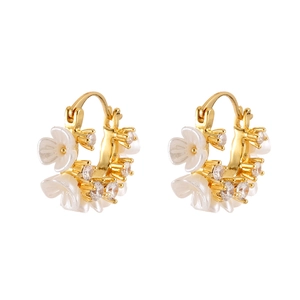 French vintage gold flower hoop earrings with white petals and sparkling cubic zirconia