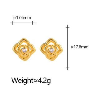 Elegant gold flower stud earrings with spiral texture and center zircon stone inlay