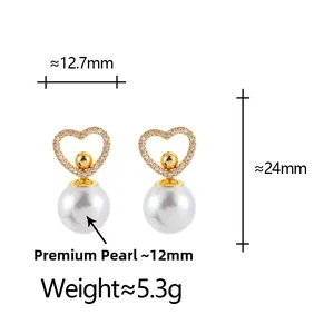 Detailed view of heart-shaped earrings with 12mm lustrous pearls and zircon setting