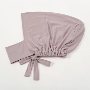Detail of dusty pink elastic modal hijab undercap with adjustable ties and pleated back