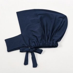 Detail of navy blue hijab undercap featuring elastic back and adjustable tie-back ribbons