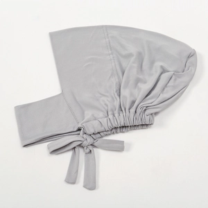 Detail of light gray tie-back hijab inner cap with elasticated pleated back design