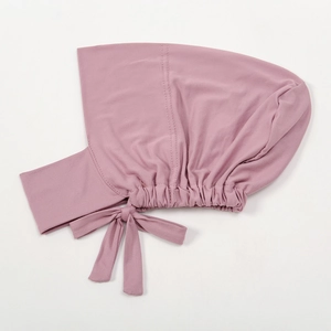 Elastic milk silk hijab undercap in lotus pink with tie-back design and ruched detail