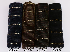 Detailed view of pleated lace scarf fabric with sequins in four dark elegant colors