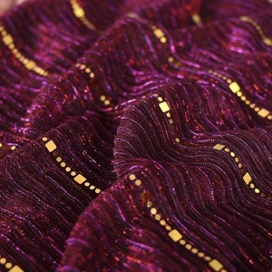 Deep burgundy pleated lace scarf with metallic gold sequins for a luxurious festive style