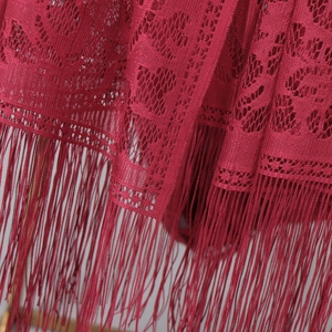 Elegant dark red lace shawl with hollow floral patterns and long fringe tassels