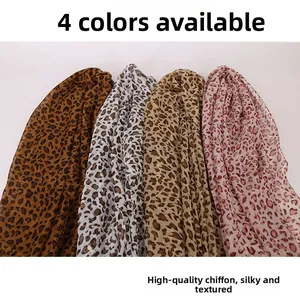 Detail of premium leopard print chiffon scarves showing four color options and smooth texture