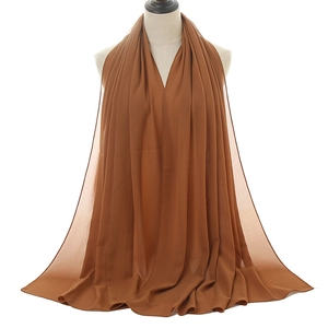 Breathable dark brown pearl chiffon hijab long shawl scarf displayed on mannequin