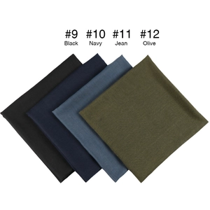Detail showing four color options for square scarves: Black, Navy, Jean, and Olive Green