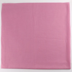 Detailed macro view of cherry pink square scarf showing breathable woven fabric texture
