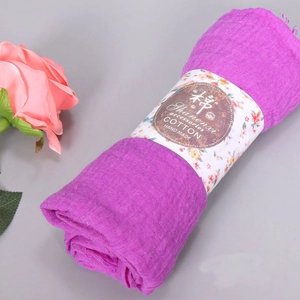 Wrinkled purple cotton linen scarf for women with fringe edge and floral packaging