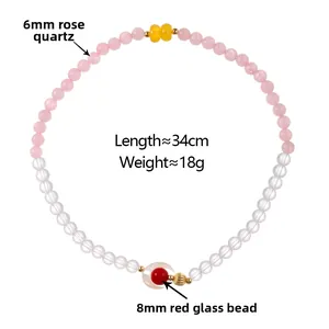 Detailed view of 34cm beaded necklace with 6mm rose quartz and 8mm red glass beads