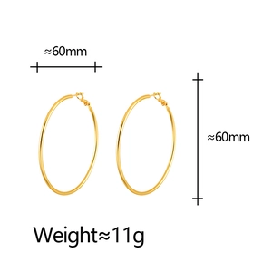 Minimalist 60mm gold hoop earrings with matte finish and 11g lightweight design