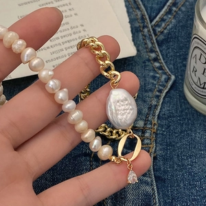 Elegant natural freshwater pearl necklace with gold plated chain and baroque pendant