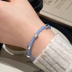 Adjustable light blue agate beaded bracelet with silver butterfly charms for women