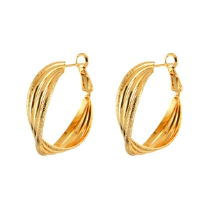 Golden Möbius hoop earrings featuring multi-layered matte and polished metal ring bands