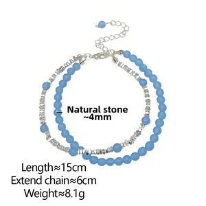 Detail view of double-layer beaded bracelet with blue natural stones and lobster clasp