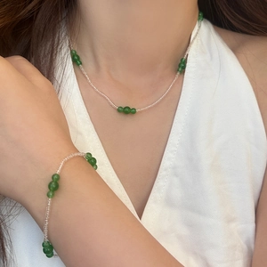 Elegant natural green stone beaded necklace and bracelet set for women in minimalist style