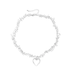 White crystal heart necklace featuring natural irregular stones and metal pendant
