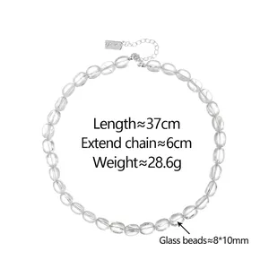 Minimalist clear glass bead necklace with silver metal extension chain and lobster clasp