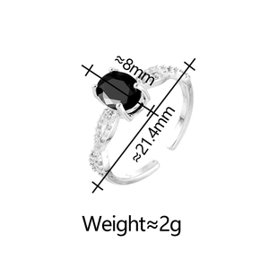 Detail showing dimensions of silver ring with 8mm oval black stone and side diamonds