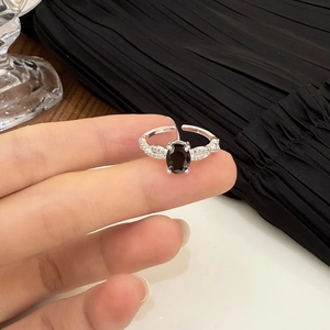 European vintage silver ring with oval black stone and twisted pavé zircon band